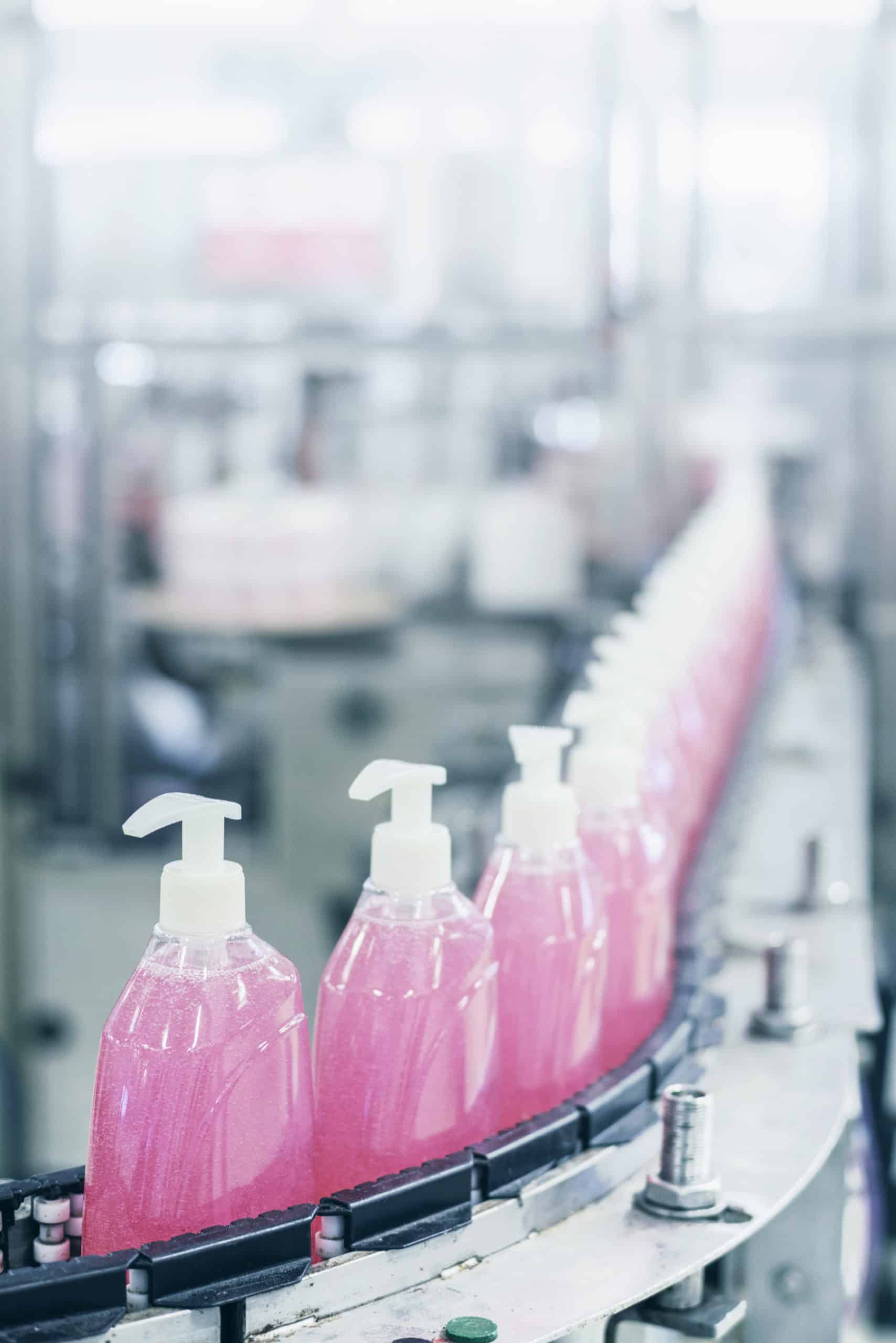 Bottles of soap on assembly line.