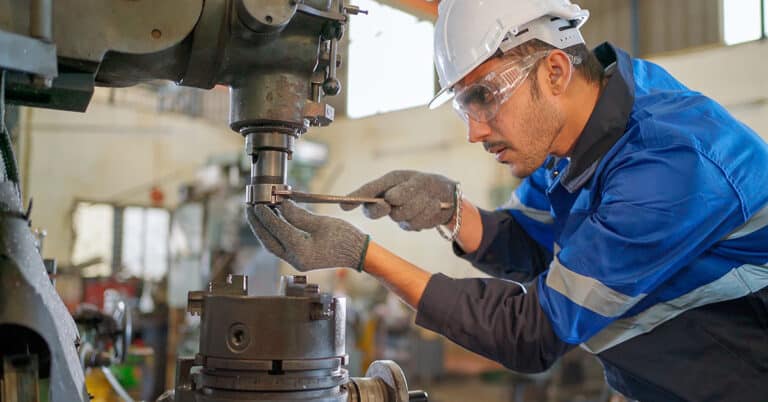 Maintenance technician working on a piece of equipment