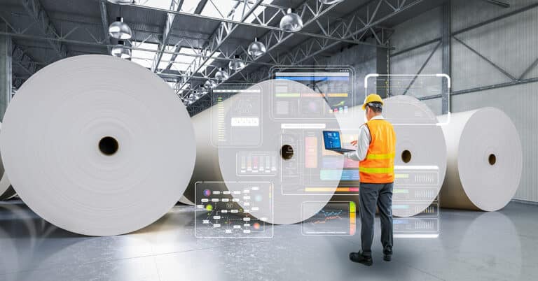 Engineer or technician work in paper factory with computer notebook and digital interface