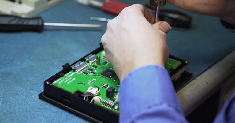 Technician working fixing part components