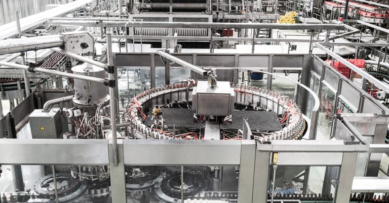 Indoor view of beverages factory and production line.