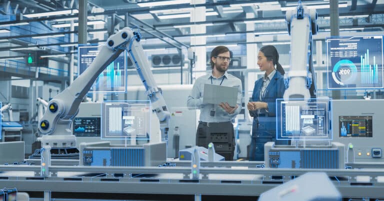 Two managers discussing work while futuristic computer vision analyzes and scans conveyor line.