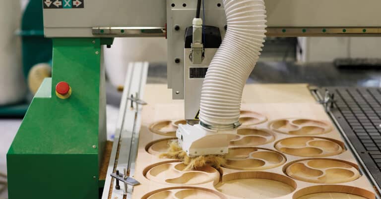 Production process with CNC wood carving router machine.