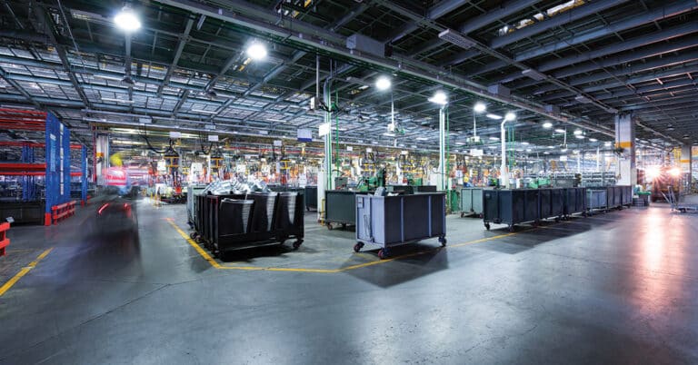 Modern automatic automobile manufacturing workshop. A busy car production line. Industrial scenery background.
